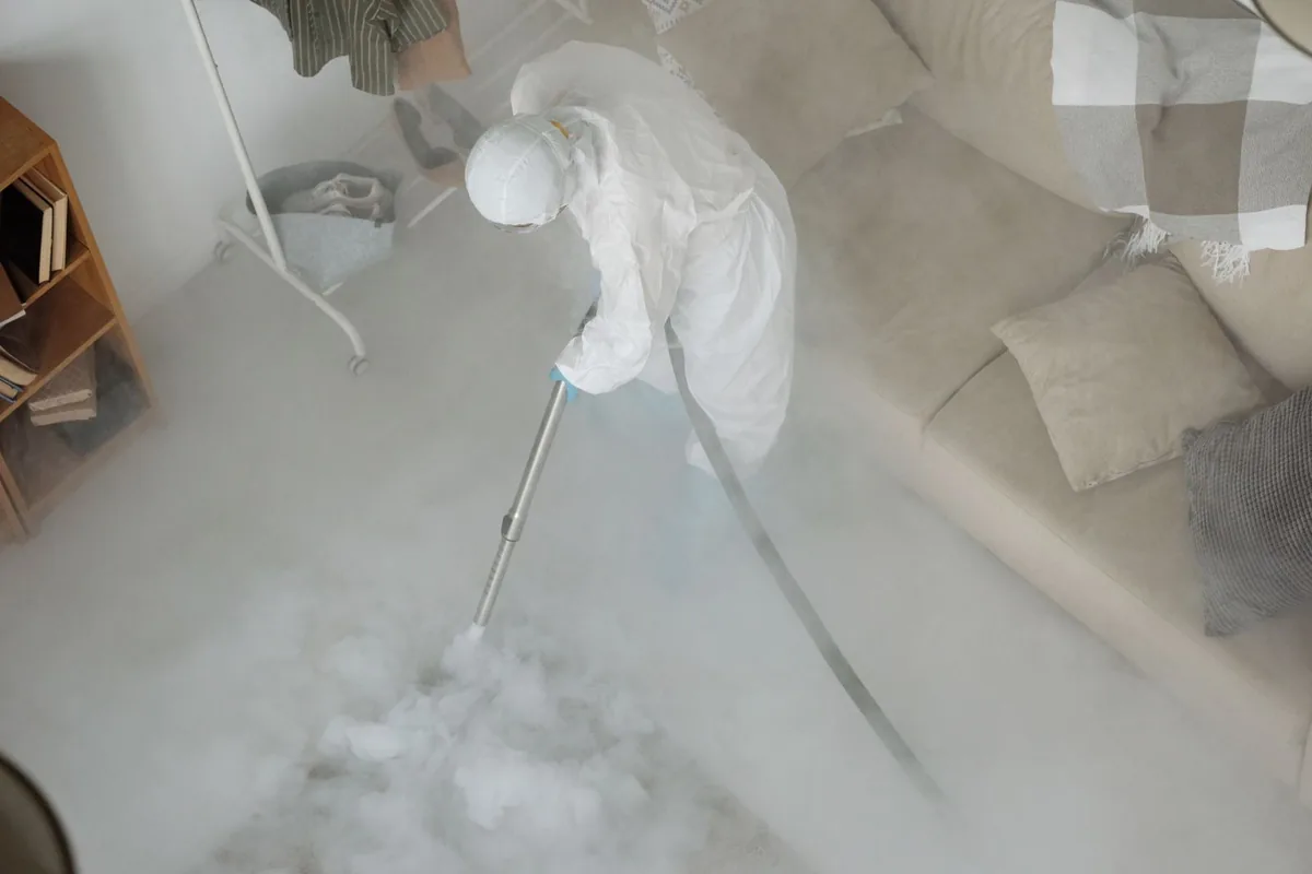 Biohazard cleanup technician in protective equipment, North Caldwell, NJ